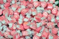 Colorful pink and white salt water taffy