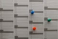 Colorful pins on the calendar. Royalty Free Stock Photo