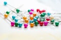 Colorful pins on the surface Royalty Free Stock Photo