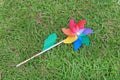 Colorful pinwheel on the green grass Royalty Free Stock Photo