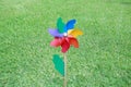 Colorful pinwheel over green grass Royalty Free Stock Photo