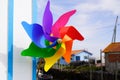 Colorful pinwheel in summer beach street for children wheels play wind in plastic Royalty Free Stock Photo