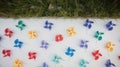 Colorful pinwheels arranged in vibrant patterns on a sunny day. Royalty Free Stock Photo