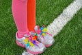 Colorful pipe cleaners on sport shoes Royalty Free Stock Photo