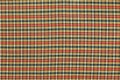 Colorful plaid Thai traditional fabric texture - orange, yellow, and black color in regtangle shape as background