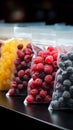 Colorful plastic bags house a selection of frozen berries on a store shelf Royalty Free Stock Photo