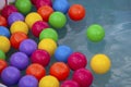 Colorful plastic balls in a pool Royalty Free Stock Photo