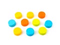 Colorful plastic bottle caps on white background. selective focus Royalty Free Stock Photo