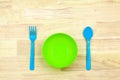 Colorful plastic bowl and Cutlery Royalty Free Stock Photo