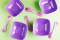 Colorful plastic bowls and sporks Royalty Free Stock Photo