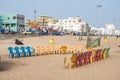 Colorful plastic chairs arranged at Puri Beach, India Royalty Free Stock Photo