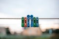 Colorful plastic clothespins on the hangers, clothespins on the hangers rope for wash clothes Royalty Free Stock Photo