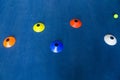 Colorful plastic cones on a blue cement tennis court. Top view Royalty Free Stock Photo