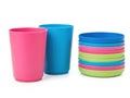 Colorful plastic cups and bowls set isolated on white background Royalty Free Stock Photo