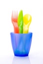 Colorful plastic cutlery in cup Royalty Free Stock Photo