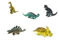 Colorful plastic dinosaurs toys  on a white background Royalty Free Stock Photo