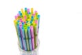 Colorful plastic drinking straws in the glass. Royalty Free Stock Photo