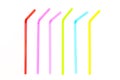 Pile of colorful plastic drinking straws isolated on white background. Royalty Free Stock Photo