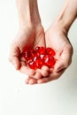 Colorful plastic hearts in a hand Royalty Free Stock Photo