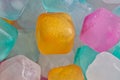 Colorful plastic ice cube blocks, closeup abstract background. Royalty Free Stock Photo