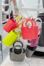 Colorful plastic and polystyrene baskets for packaging gifts and flowers on the shelves of the Hypermarket . Festive minimal gift