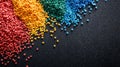 Colorful Plastic Resin Granules on Black Background Royalty Free Stock Photo