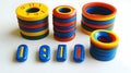 Colorful plastic rings and blocks on white background Royalty Free Stock Photo