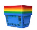 Colorful plastic shopping baskets on white Royalty Free Stock Photo