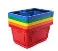 Colorful plastic shopping baskets on white Royalty Free Stock Photo