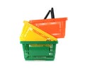 Colorful plastic shopping baskets on white Royalty Free Stock Photo