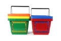 Colorful plastic shopping baskets on white Royalty Free Stock Photo