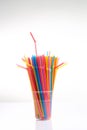 colorful plastic straws in a cup