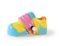 Colorful plastic toy mechanical sneaker isolated