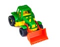 Plastic toy wheeled tractor loader excavator, isolated Royalty Free Stock Photo