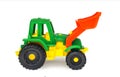 Plastic toy wheeled tractor loader excavator, isolated Royalty Free Stock Photo