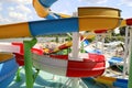 Colorful plastic water-slides in aqua park. Part of the water park - a slide element of blue, yellow, red, white. Dnipro city, Royalty Free Stock Photo