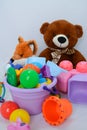 Colorful plastic and wooden toys in baby room Royalty Free Stock Photo