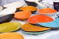 Colorful plates and bowls for sale at a local market