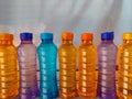 Colorful platic water bottles filled with water Royalty Free Stock Photo