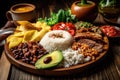 colorful platter of colombian food, with assortment of rice, beans, and meats