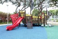 Colorful playground for childrens in public housing block. Royalty Free Stock Photo