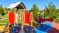 Colorful playground with slide in a city park Royalty Free Stock Photo