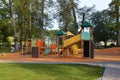 Colorful playground with swings and slides Royalty Free Stock Photo