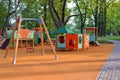 Colorful playground with swings and slides Royalty Free Stock Photo