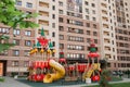 Colorful playground on yard. soft coating for children`s playgrounds from rubber crumb. Royalty Free Stock Photo