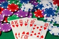 Colorful poker chips and royal flush Royalty Free Stock Photo