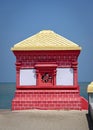 Colorful police outpost at lands end on South East boundary of India at Dhanushkodi. Text in local language is the translation of