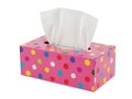 Colorful polka dot tissue box with white tissues Royalty Free Stock Photo