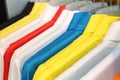 Colorful polo shirt on a hanger Royalty Free Stock Photo