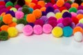 A colorful Pom Pom onwhite background,